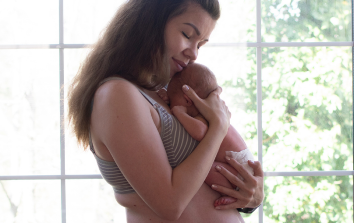 mother holding baby
